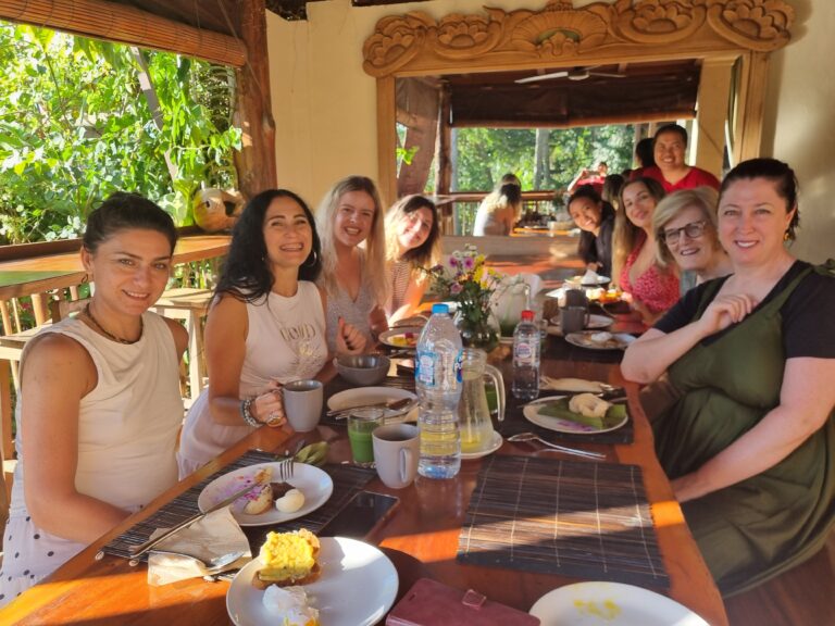 women sitting around the breakfast table in Bali