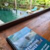 Feminine Power Retreat workbook and pool area