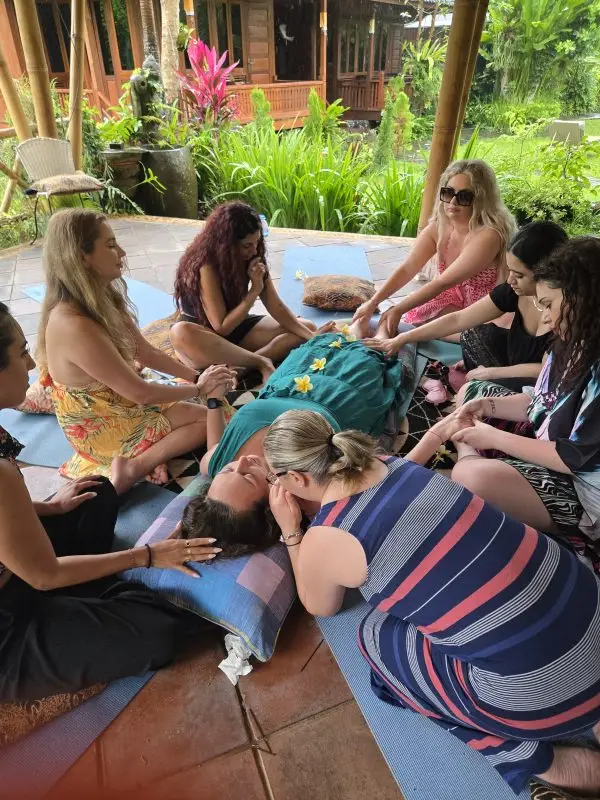 Women in a closing ceremony at a Bali Retreat